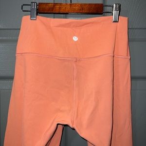 Peach/orange Lululemon tights leggings